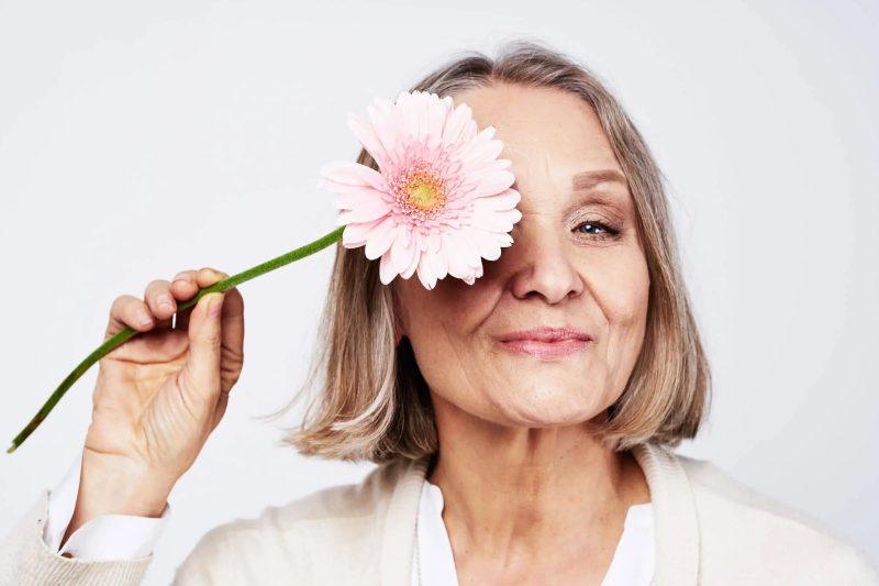 Embrace Timeless Beauty with Natural Solutions from 100% PURE
<em>Posted on May 23, 2024</em> <em>Written by: 100% PURE®</em>
As we journey through life, our skin inevitably reflects the passage of time. The natural process of skin aging is a multifaceted phenomenon influenced by a combination of genetic, environmental, and lifestyle factors. Common signs of aging skin include wrinkles, fine lines, and a gradual loss of elasticity, all of which can impact our appearance and confidence. Understanding these signs is crucial for addressing them effectively, particularly with natural, scientifically-backed solutions that promote healthy, vibrant skin.
At 100% PURE, we believe in harnessing the power of nature to combat the signs of aging. Our products are formulated with high-quality, natural ingredients that are both effective and safe. These include potent antioxidants, vitamins, and botanical extracts known for their ability to nourish and rejuvenate the skin. By integrating these scientifically-backed solutions into your daily routine, you can achieve healthier, more youthful-looking skin without compromising on safety or ethics.
Understanding the signs of aging and the underlying processes allows us to take proactive steps in our skincare regimen. Embracing natural solutions not only helps to mitigate the visible effects of aging but also supports overall skin health, ensuring that your skin remains resilient and radiant for years to come.
The Science Behind Aging Skin
Aging skin is a multifaceted process influenced by an intricate interplay of biological factors, environmental stressors, and lifestyle choices. Understanding these underlying mechanisms is crucial for devising strategies to maintain youthful skin and mitigate the signs of aging.
Biological Factors
Decreased Collagen Production
One of the primary biological contributors to skin aging is the reduction in collagen production. Collagen, a protein that provides structure and elasticity to the skin, diminishes with age. This decline starts in the mid-20s and accelerates over time. By the age of 60, the skin’s collagen content can drop by up to 30%. The reduced collagen weakens the skin’s support structure, leading to sagging, fine lines, and wrinkles.
Loss of Elastin and Hyaluronic Acid
Elastin, another crucial protein, allows the skin to resume its shape after stretching or contracting. Like collagen, elastin production also decreases with age, contributing to less resilient skin that is prone to sagging and wrinkles. Additionally, the natural production of hyaluronic acid, which hydrates and plumps the skin, diminishes. This reduction leads to dryer, thinner skin that appears more aged.
Environmental Stressors
Ultraviolet (UV) Radiation
Prolonged exposure to UV radiation from the sun is one of the most significant external factors affecting skin aging. UV rays penetrate the skin, damaging the DNA in skin cells and accelerating the breakdown of collagen and elastin fibers. This process, known as photoaging, results in premature wrinkles, age spots, and an uneven skin tone. UV radiation can also impair the skin’s natural repair mechanisms, exacerbating the visible signs of aging.
Pollution and Toxins
Environmental pollutants such as smog, dirt, and chemicals can penetrate the skin barrier, leading to oxidative stress. These pollutants generate free radicals and unstable molecules that damage cells, proteins, and DNA. The cumulative effect of this oxidative stress accelerates skin aging, resulting in dullness, uneven pigmentation, and the formation of fine lines and wrinkles.
Lifestyle Choices
Diet and Nutrition
A balanced diet rich in antioxidants, vitamins, and minerals plays a pivotal role in maintaining healthy skin. Nutrients such as vitamin C, vitamin E, and omega-3 fatty acids combat oxidative stress and support collagen synthesis. Conversely, a diet high in processed foods, sugars, and unhealthy fats can accelerate skin aging by promoting inflammation and glycation—a process where sugar molecules attach to proteins like collagen, making them stiff and prone to damage.
Smoking and Alcohol Consumption
Smoking introduces a plethora of toxins into the body, which reduces blood flow to the skin, depriving it of oxygen and essential nutrients. This habit not only accelerates the breakdown of collagen and elastin but also leads to the formation of wrinkles, particularly around the mouth. Alcohol dehydrates the skin and dilates blood vessels, contributing to redness, puffiness, and a loss of skin elasticity over time.
Stress and Sleep
Chronic stress and lack of sleep can wreak havoc on the skin. Stress triggers the release of cortisol, a hormone that can break down collagen and hinder the skin’s ability to repair itself. Sleep deprivation disrupts the skin’s natural repair processes, leading to increased signs of aging such as dark circles, a dull complexion, and more pronounced wrinkles.
Impact on Skin’s Appearance and Health
The cumulative effect of these biological, environmental, and lifestyle factors results in noticeable changes in the skin’s appearance and health. Reduced collagen and elastin manifest as sagging and wrinkles, while diminished hyaluronic acid leads to dryness and loss of volume. Environmental stressors like UV radiation and pollution cause uneven pigmentation and texture, and poor lifestyle choices further exacerbate these issues, leading to prematurely aged skin.
By understanding these underlying mechanisms, individuals can adopt proactive measures to mitigate the signs of aging. Incorporating a healthy diet, protecting the skin from environmental damage, and making mindful lifestyle choices are essential strategies to maintain youthful, healthy skin.
Natural Ingredients to Combat Aging
When it comes to maintaining youthful skin, nature offers a treasure trove of potent ingredients. Let’s delve into some of the most effective natural substances that can help defy the signs of aging and keep your skin looking radiant and fresh.
Retinol (from Carrots)
Retinol, a derivative of vitamin A, is renowned for its remarkable anti-aging properties. Extracted from carrots, this powerful ingredient enhances cell turnover, which helps to reduce the appearance of fine lines and wrinkles. By promoting the shedding of old skin cells and the formation of new ones, retinol smooths the skin’s texture and reveals a more youthful complexion. Additionally, it aids in unclogging pores, making it beneficial for those with acne-prone skin.
Vitamin C
Vitamin C is a powerhouse antioxidant that plays a crucial role in skin health. This essential nutrient boosts collagen production, a protein that maintains skin’s firmness and elasticity. By enhancing collagen synthesis, vitamin C helps to reduce the appearance of wrinkles and fine lines. Moreover, it brightens the skin by inhibiting melanin production, which helps to fade dark spots and even out skin tone. Regular use of vitamin C can lead to a more luminous and vibrant complexion.
Hyaluronic Acid
Hyaluronic acid is a naturally occurring substance in the skin known for its incredible hydrating properties. It has the unique ability to hold up to 1,000 times its weight in water, making it a superb moisturizer. By deeply hydrating the skin, hyaluronic acid plumps up fine lines and wrinkles, giving the skin a smoother and more supple appearance. Its ability to retain moisture makes it essential for maintaining the skin’s youthful elasticity and resilience.
Green Tea Extract
Green tea extract is packed with antioxidants, particularly polyphenols, which provide robust protection against environmental damage. These antioxidants help to neutralize harmful free radicals that contribute to skin aging. Green tea extract also has anti-inflammatory properties that can soothe irritated skin and reduce redness. By protecting the skin from oxidative stress, green tea extract helps to preserve its youthful look and feel.
Rosehip Oil
Rosehip oil, derived from the seeds of rose bushes, is rich in essential fatty acids and vitamins A and C. This nourishing oil helps to regenerate skin cells and repair damaged tissues, making it excellent for reducing the appearance of scars and fine lines. Its high concentration of antioxidants helps to fight free radicals and prevent premature aging. Rosehip oil also deeply hydrates the skin, improving its overall texture and tone, and leaving it looking rejuvenated and radiant.
Incorporating these natural ingredients into your skincare routine can provide powerful anti-aging benefits. By leveraging the gifts of nature, you can enhance your skin’s health, defy the signs of aging, and unveil a more youthful, glowing complexion.
Success Stories: Real Results with 100% PURE
When it comes to combating the signs of aging, the real proof of effectiveness lies in the stories and testimonials of those who have experienced the transformative power of 100% PURE products firsthand. These inspiring success stories highlight the natural solutions that have made a significant difference in the lives of our customers.
Retinol Restorative Overnight Balm
Briana C. shares her long-term experience with the Retinol Restorative Overnight Balm, a product she considers essential in her skincare routine. She explains, “This is one of my must-have products. I have been using it for a few years now and have noticed a significant difference in my skin. I use it every night.” Briana’s continued use and noticeable results underscore the balm’s effectiveness in improving skin texture and reducing the signs of aging over time.
Green Tea SPF 30
Jennifer conducted a comparative test with the Green Tea SPF 30 against several other sunscreens, using sunblock reminder stickers to track performance. She notes, “I did a sunscreen test comparing this sunscreen to several other sunscreens using sunblock reminder stickers. You can see in the pictures, it’s the second one from the right. I did a 30-minute gym exercise and some chores trying not to touch the stickers during the summer evening, and you can see 1.5 hours after application, the 100% PURE sunblock performed much better than the majority, as shown by the sticker starting barely having a purple tint in the last pic. The other contenders that seemed to be able to compete were Sun Bum’s SPF 70, SunCut’s UV Perfect Essence Super Waterproof, and Kahi’s Aqua Balm. For something rated SPF 30, this performed amazingly well! On par with Sun Bum’s SPF 70! Not gonna lie, the consistency wasn’t great, but for something with ingredients this clean and performance this great, it’s worth repurchasing!” Jennifer’s thorough testing and high praise highlight the superior protection and clean ingredients of the Green Tea SPF 30.
Intensive Nourishing Facial Oil
Pamela D., at the age of 69, has faced both fine lines and occasional acne breakouts. She expresses her satisfaction with the Intensive Nourishing Facial Oil, stating, “Love, love, love this product! I’m at the age (69) where fine lines/wrinkles AND some acne breakouts, on occasion, are concerns. I’ve tried literally everything, regardless of cost, but hands down THIS product has been a game-changer! Naturally, it is oily, but a small amount goes a long way during the day, and a bit more at night. I recommend you give it a try if you haven’t already.” Pamela’s enthusiasm and the significant improvement she has seen in her skin speak volumes about the efficacy of this nourishing facial oil.
These testimonials reflect the positive experiences of customers who have integrated 100% PURE products into their skincare routines. Their stories demonstrate the transformative effects and reliable results that come from using natural, high-quality ingredients to defy the signs of aging.
Creating an Anti-Aging Skincare Routine
Building an effective anti-aging skincare routine is essential to maintain a youthful complexion and slow down the signs of aging. Using high-quality, natural products can make a significant difference. Here’s a step-by-step guide to creating an anti-aging skincare routine with 100% PURE products.
Morning Routine:
<a href="https://www.100percentpure.com/collections/cleansers/products/calendula-flower-cleansing-milk">Calendula Flower Cleansing Milk</a>
Start your day with a gentle cleanser. The Calendula Flower Cleansing Milk from 100% PURE offers a silky smooth, gently foaming milk cleanser that sweeps away traces of dirt, sunblock, and environmental pollutants. This cleanser utilizes moisturizing sea buckthorn oil, hydrating rose hydrosol, and calming chamomile to deeply nourish and soften both dry and sensitive skin types.
<a href="https://www.100percentpure.com/collections/anti-aging-products/products/vitamin-c-serum">Vitamin C Serum</a>
After cleansing, apply a lightweight, stabilized Vitamin C serum to boost collagen and elastin production. The 100% PURE Vitamin C Serum is formulated in a base of hydrating and soothing aloe gel, which helps to firm and brighten skin tone while promoting collagen production. It includes radiance-boosting ingredients like green apple and grape, plus alpha lipoic acid (ALA) for fighting oxidative damage that can prematurely age or darken the skin.
<a href="https://www.100percentpure.com/collections/moisturizers/products/hydra-drench-cream">Hydra Drench Cream</a>
Lock in hydration with the Hydra Drench Cream. This lightweight, quickly absorbing formula rehydrates thirsty skin with omega fatty acid-rich gel water from chia seeds. Suitable for all skin types, this moisturizer ensures your skin stays hydrated. For oily skin, it provides sufficient moisture, while those with drier skin may layer an additional oil-based moisturizer over this light face moisturizer.
<a href="https://www.100percentpure.com/collections/sunscreen/products/green-tea-spf-30">Green Tea SPF 30</a>
Protect your skin from the sun’s harmful UV rays with Green Tea SPF 30. This dual-purpose sunscreen from 100% PURE shields and nourishes your skin, thanks to the natural mineral zinc oxide and the anti-aging properties of green tea. It also includes the powerful antioxidant benefits of vitamin E, hydrating aloe, and refreshing cucumber juice, along with nourishing oils of raspberry, avocado, olive, and rosehip for comfortable all-day wear.
Evening Routine:
<a href="https://www.100percentpure.com/collections/anti-aging-products/products/argan-oil-creamy-cleanser">Argan Oil Creamy Cleanser</a>
In the evening, start with a rich and creamy cleanser that removes makeup and impurities while moisturizing your skin. The Argan Oil Creamy Cleanser from 100% PURE is loaded with silky smooth argan oil, anti-aging rosehip, and antioxidant-rich açai. This cleanser leaves skin super soft and supple without stripping healthy lipids or moisture, making it perfect for dry and sensitive skin.
<a href="https://www.100percentpure.com/collections/anti-aging-products/products/retinol-restorative-overnight-balm">Retinol Restorative Overnight Balm</a>
Apply the Retinol Restorative Overnight Balm to improve the appearance of firmness, tone, and elasticity while you sleep. This overnight retinol cream is formulated with nourishing vitamins and antioxidants to enhance your skin’s natural glow. The vegan retinol promotes a more evenly toned complexion and reduces the appearance of lines and wrinkles. It’s enriched with rich avocado butter and plant oils to soften and deeply moisturize, with a light infusion of skin-toning organic jasmine essential oil.
<a href="https://www.100percentpure.com/collections/moisturizers/products/intensive-nourishing-facial-oil">Intensive Nourishing Facial Oil</a>
Finish your evening routine with a deeply nourishing, ultra-lightweight night oil. The 100% PURE Intensive Nourishing Facial Oil provides long-lasting hydration without clogging pores. This potent blend of clarifying oils and anti-aging antioxidants is beneficial for all skin types, including sensitive, oily, or acne-prone skin.
By following these steps with 100% PURE products, you can create a comprehensive anti-aging skincare routine that addresses all your skin’s needs from morning to night, ensuring a youthful and radiant complexion.
FAQ Section: Addressing Aging Skin Concerns
What is the most effective natural ingredient for reducing wrinkles?
One of the most effective natural ingredients for reducing wrinkles is retinol, derived from vitamin A. Natural sources like rosehip seed oil and carrot seed oil are rich in vitamin A and its derivatives, which stimulate collagen production and enhance cell turnover. Other powerful natural ingredients include hyaluronic acid, which deeply hydrates and plumps the skin, and vitamin C, which brightens the skin and improves elasticity.
Can natural products be as effective as synthetic ones for anti-aging?
Yes, natural products can be as effective as synthetic ones for anti-aging. Many natural ingredients provide potent anti-aging benefits without the harsh side effects often associated with synthetic chemicals. Ingredients like green tea extract, which is rich in antioxidants, and peptides from natural sources can offer similar, if not superior, results in reducing the appearance of fine lines, boosting collagen, and protecting the skin from environmental damage.
How long does it take to see results with natural anti-aging products?
The time it takes to see results with natural anti-aging products can vary depending on the specific product and individual skin type. Generally, you can expect to see noticeable improvements within 4 to 8 weeks of consistent use. Factors such as the severity of aging signs, the frequency of application, and overall skincare routine also play a significant role in the time frame for visible results.
Are 100% PURE products suitable for sensitive aging skin?
Yes, 100% PURE products are suitable for sensitive aging skin. They are formulated with gentle, natural ingredients that are less likely to cause irritation or adverse reactions. The brand is committed to using non-toxic, cruelty-free, and organic ingredients, making their products an excellent choice for those with sensitive skin. However, it’s always recommended to do a patch test before introducing any new product into your skincare routine.
What lifestyle changes can support an anti-aging skincare routine?
Several lifestyle changes can support an anti-aging skincare routine:
Healthy Diet: Consuming a balanced diet rich in antioxidants, vitamins, and minerals can nourish the skin from within. Foods like berries, leafy greens, nuts, and fatty fish are particularly beneficial.
Hydration: Drinking plenty of water helps maintain skin elasticity and flush out toxins.
Sun Protection: Using sunscreen daily protects the skin from harmful UV rays, which are a major cause of premature aging.
Regular Exercise: Physical activity improves blood circulation, which can enhance skin health and appearance.
Adequate Sleep: Getting enough sleep allows the skin to repair and regenerate, reducing signs of fatigue and aging.
Stress Management: Practices like yoga, meditation, and mindfulness can reduce stress, which often contributes to skin issues.
By integrating these lifestyle changes with a natural skincare routine, you can significantly enhance the overall health and appearance of your skin.
Conclusion
Understanding the intricate process of skin aging is the first step toward effectively addressing its signs. As we’ve explored, factors such as collagen loss, decreased elasticity, and environmental damage contribute significantly to the visible signs of aging. By recognizing these changes, we can better tailor our skincare routines to combat them.
Natural solutions offer a gentle yet powerful approach to maintaining youthful, healthy skin. Ingredients like vitamin C, hyaluronic acid, and green tea provide essential nutrients and antioxidants that support skin health from the inside out. These natural remedies not only help reduce wrinkles and fine lines but also enhance the skin’s overall texture and radiance.
To truly defy the signs of aging, consistency and personalization in your skincare routine are key. 100% PURE offers a range of anti-aging products designed to cater to various skin types and concerns. From potent serums and nourishing creams to revitalizing masks, their products harness the power of natural ingredients to deliver visible results without harsh chemicals.
We encourage you to explore 100% PURE’s collection and develop a personalized skincare regimen that aligns with your skin’s unique needs. By incorporating these natural, effective solutions, you can embark on a journey towards timeless, healthy skin that defies the signs of aging.